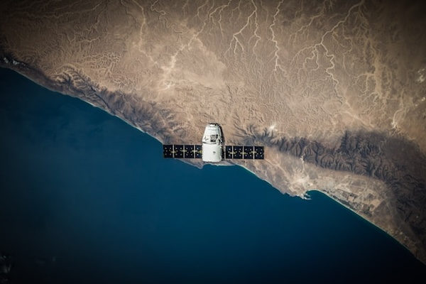 satellite above the meeting of land and sea